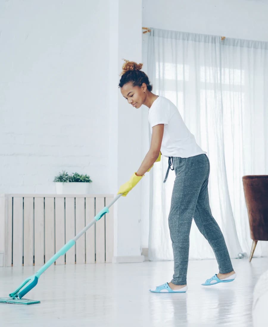 Cleaner at work in a bright living room